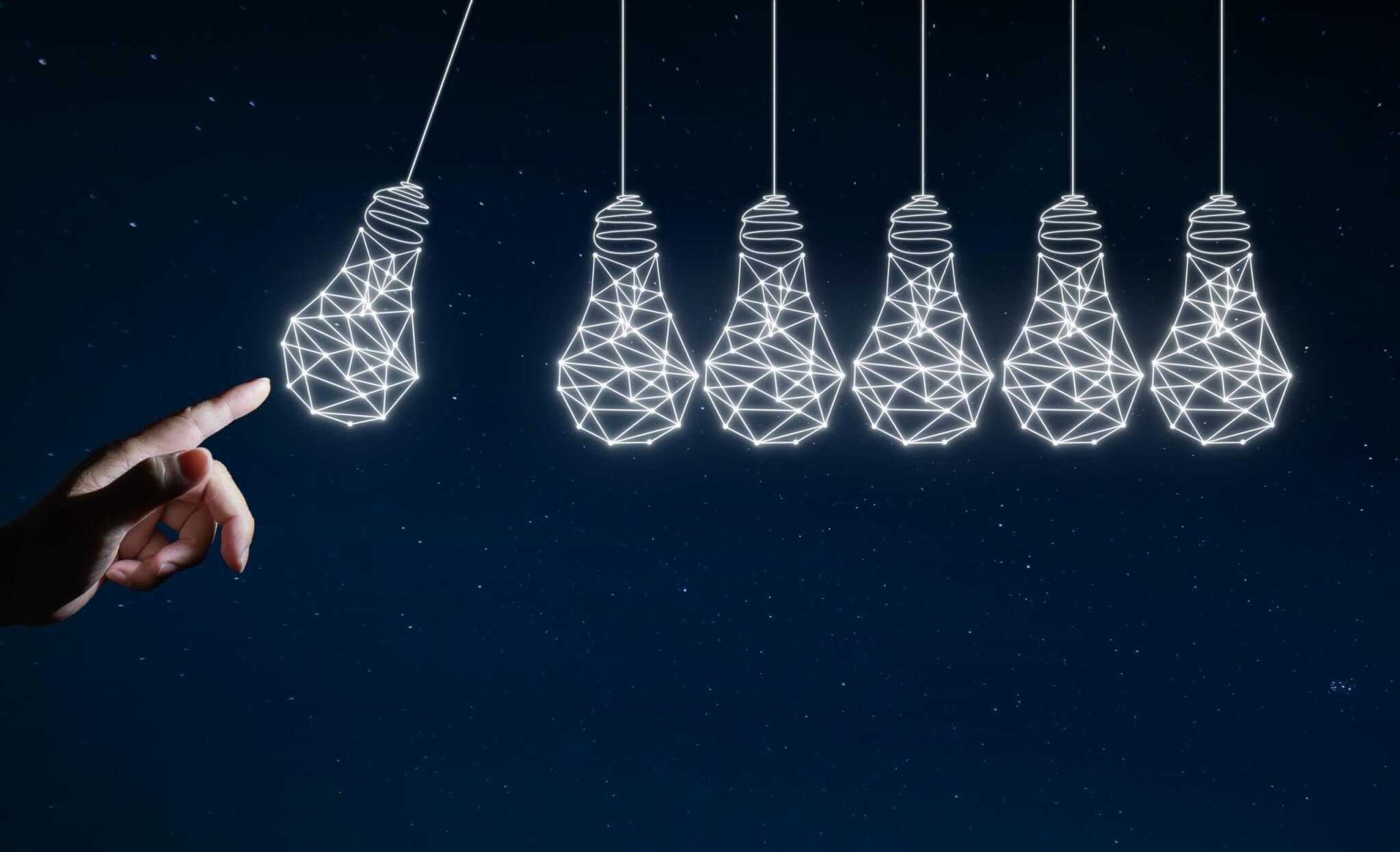 Businessman touching the idea bulb , Concept of creativity and Innovation .